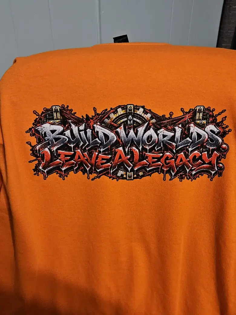 Real heat-pressed CLS shirt: Orange · Build Worlds
