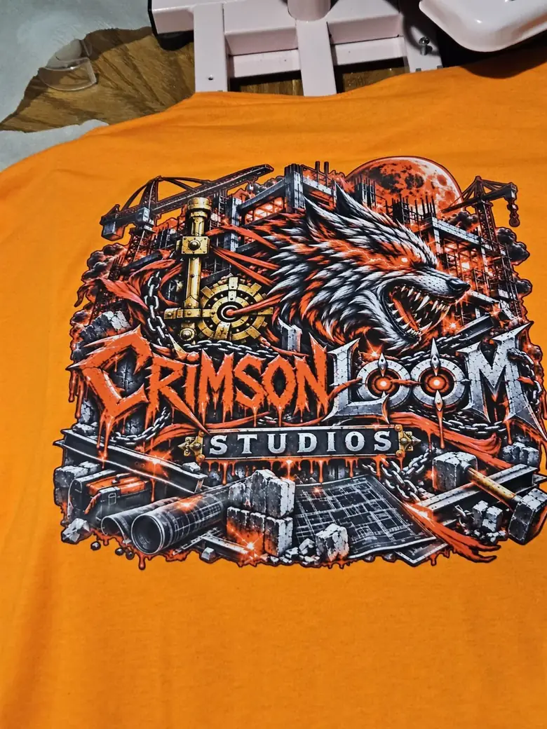 Real heat-pressed CLS shirt: Orange · Studio Logo